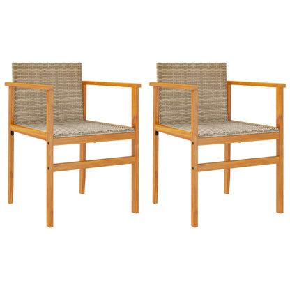 Two beige poly rattan and solid wood garden chairs on a patio