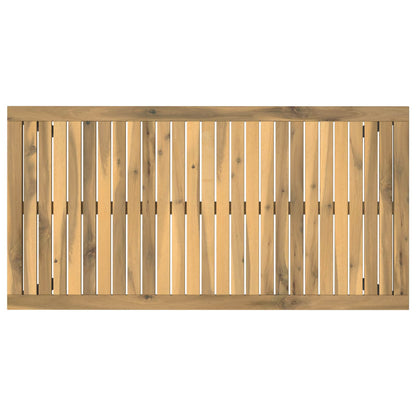 Top down view of the slatted wooden surface of the outdoor dining table