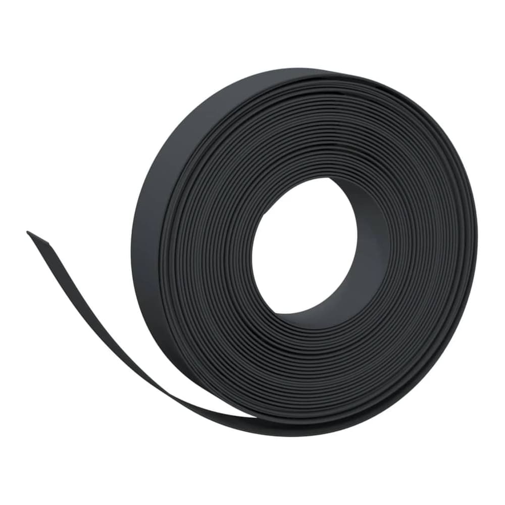 A close-up of a roll of black garden edging with a small section unrolled