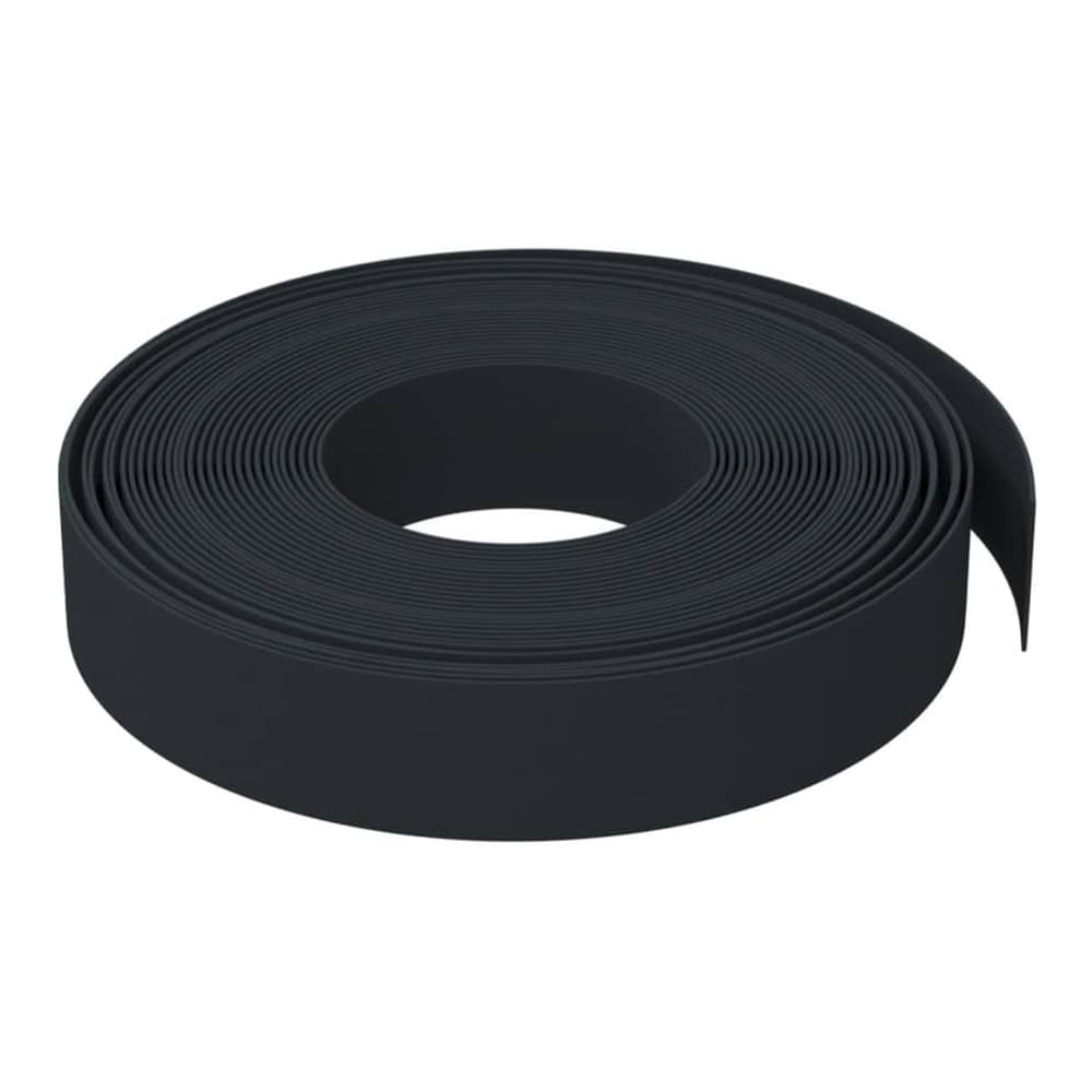 A roll of black garden edging shown from the side