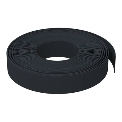 A roll of black garden edging shown from the side