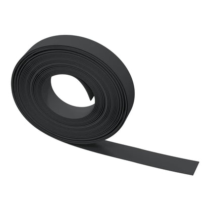 A close-up of the black garden edging material, unrolled