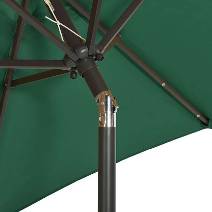 Detail of the mechanism and pole connection on the green garden parasol with LED lights