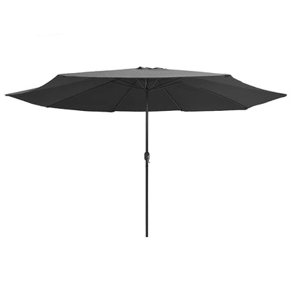 The large black garden parasol is fully open, showing its wide canopy and central pole