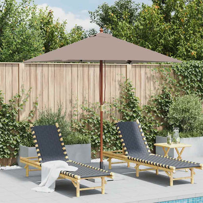 Outdoor Parasol with Wooden Pole Taupe set up by a swimming pool with two loungers