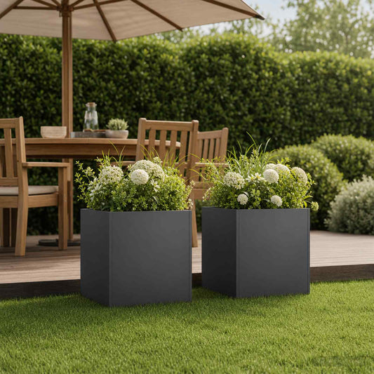 vidaXL Garden Planter 2 pcs Black Cold-rolled Steel placed on a wooden patio with green plants