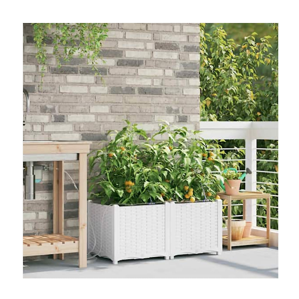 the garden planters positioned on a balcony next to a wooden sink unit