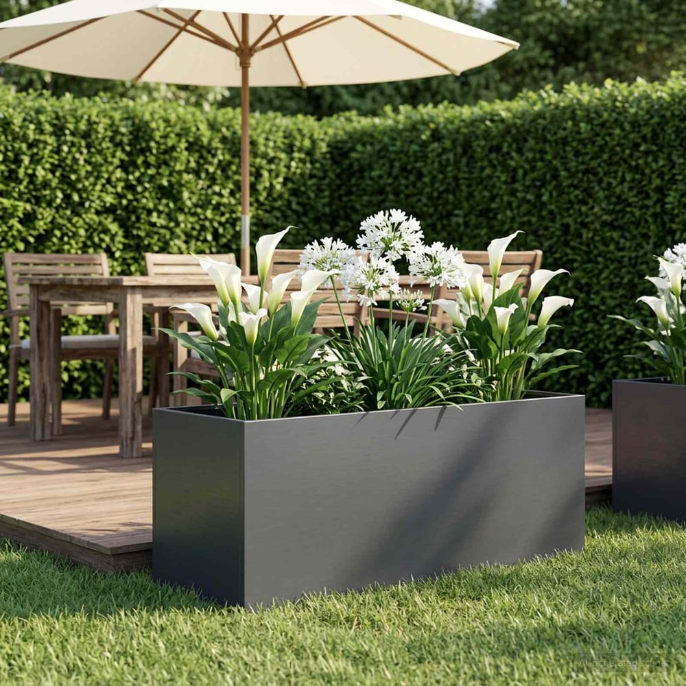 vidaXL Garden Planter Anthracite Cold-rolled Steel filled with white flowers on a patio