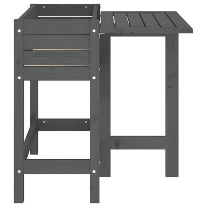 Side view of a grey wooden garden planter with a fold-out table, showing the depth
