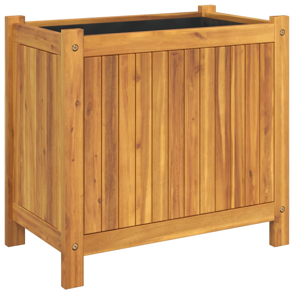 The wooden garden planter showing the black liner inside the rectangular frame