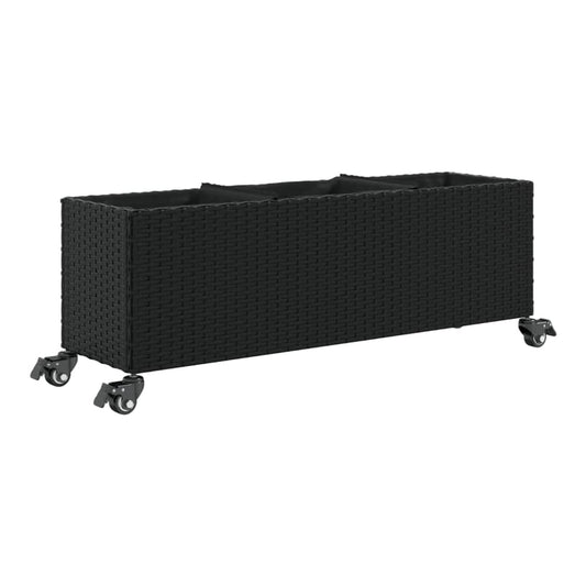 The wheeled planter, shown from a side angle with plants inside