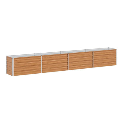 A long galvanised raised garden bed with a light brown wood effect finish