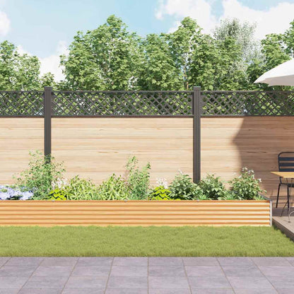 The light brown galvanised raised garden bed in a garden setting
