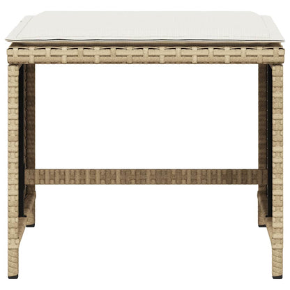 Front view of a beige poly rattan garden stool with a cushion on top