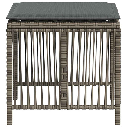 Close-up of the woven detail on a grey poly rattan garden stool with a cushion