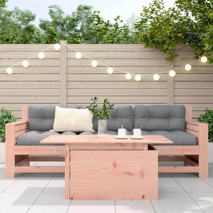 The garden table set up as a coffee table with a sofa unit