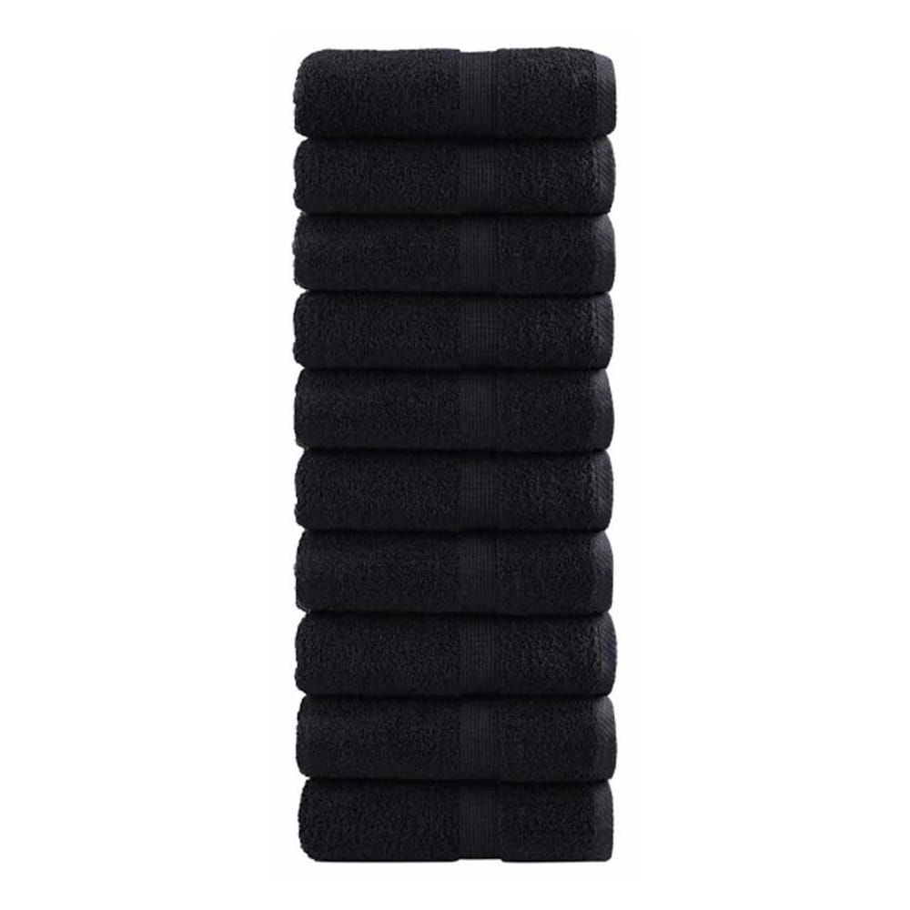 Stack of black guest towels
