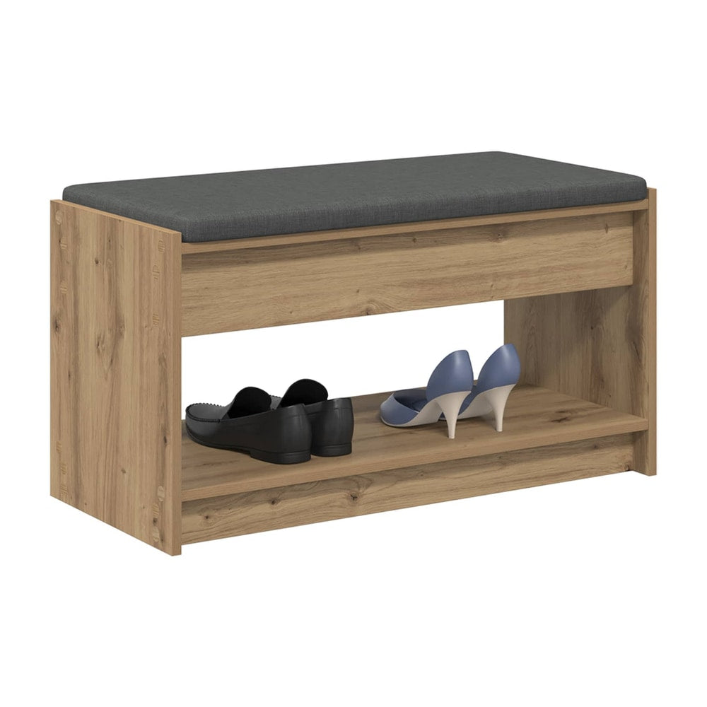 storage bench with a grey upholstered seat and two open shelves, holding shoes