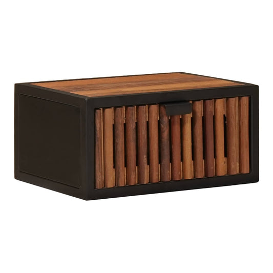 The bedside table featuring a slatted wooden drawer front and black frame