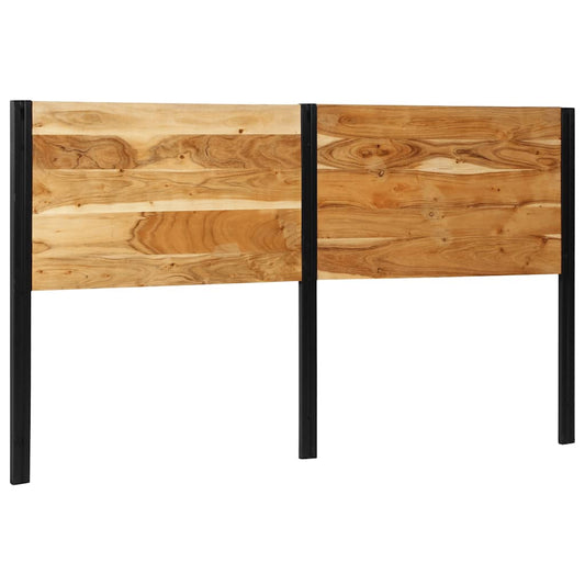 The wooden headboard with black metal frame seen from a slightly different perspective