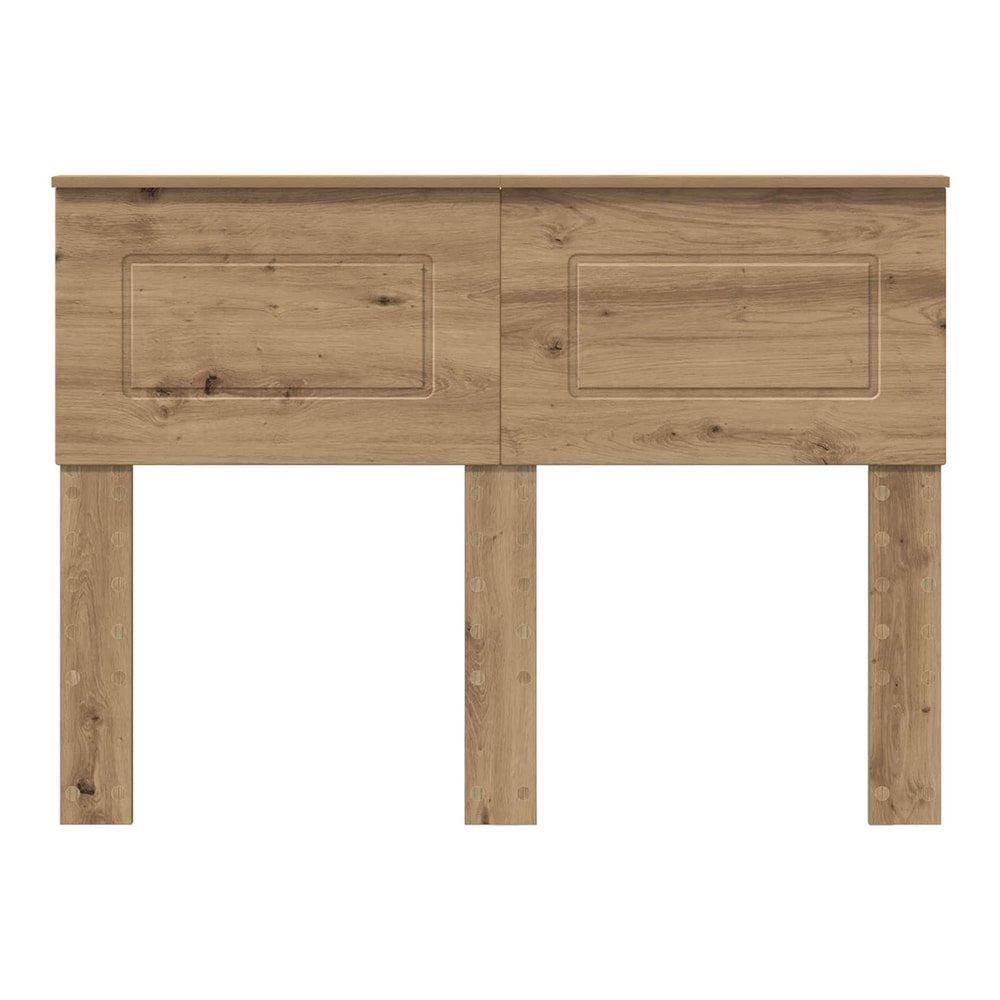 The engineered wood headboard has a light oak finish and two legs