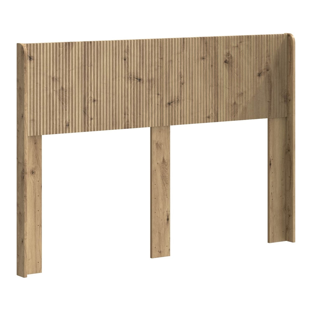 The headboard has a ribbed wood effect front panel and side supports