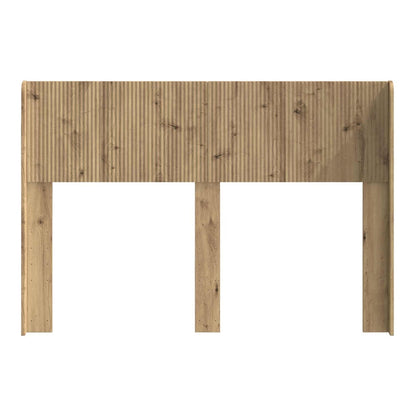 The headboard with a ribbed wood effect front panel and side supports