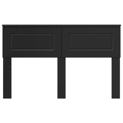 The black oak engineered wood headboard has a simple rectangular design with two inset panels