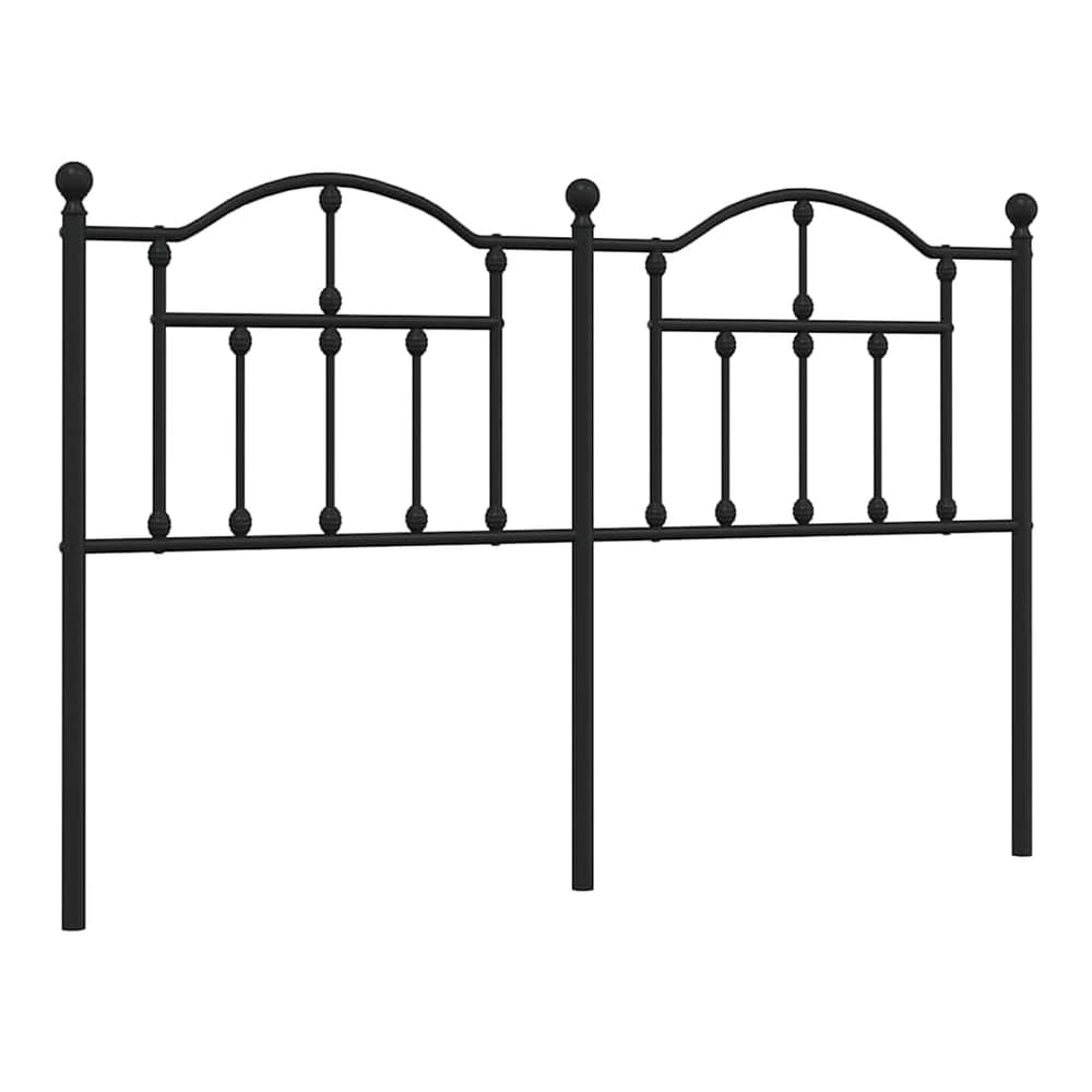 the black metal headboard standing alone against a white background