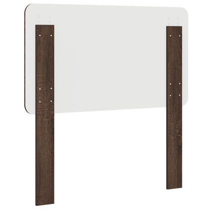 Back of the brown oak engineered wood headboard showing fixings