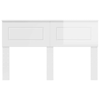 The gloss white headboard is shown from the front with its simple rectangular shape