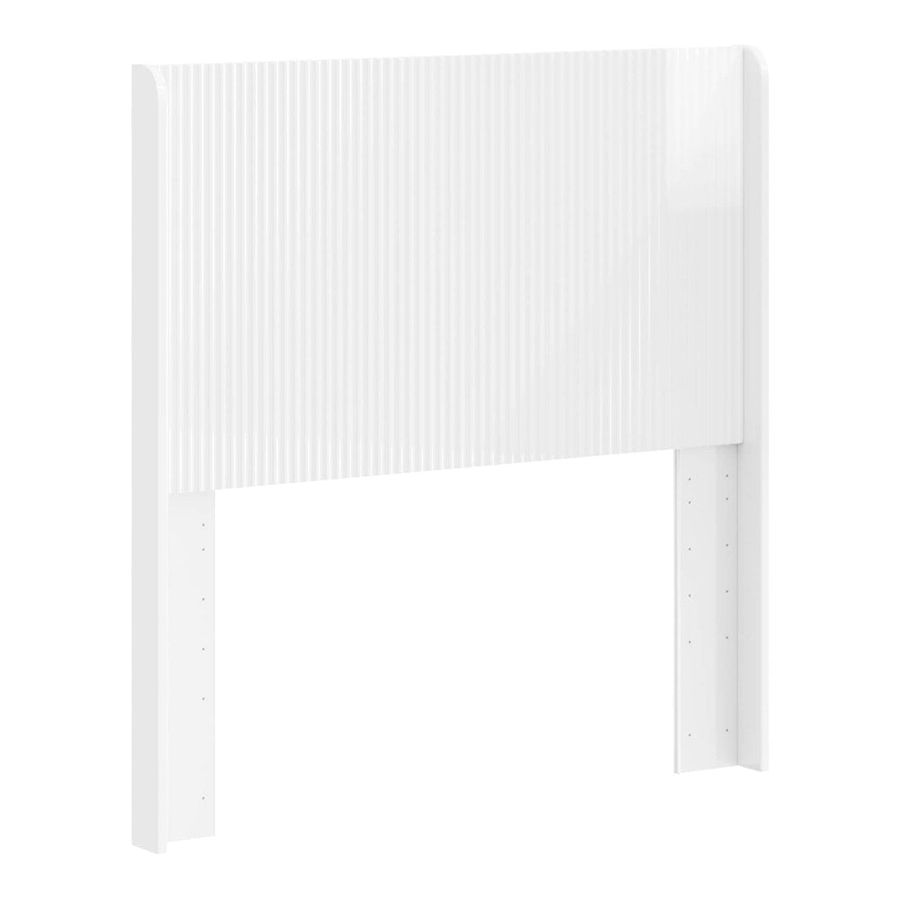 the high gloss white headboard with a ribbed texture
