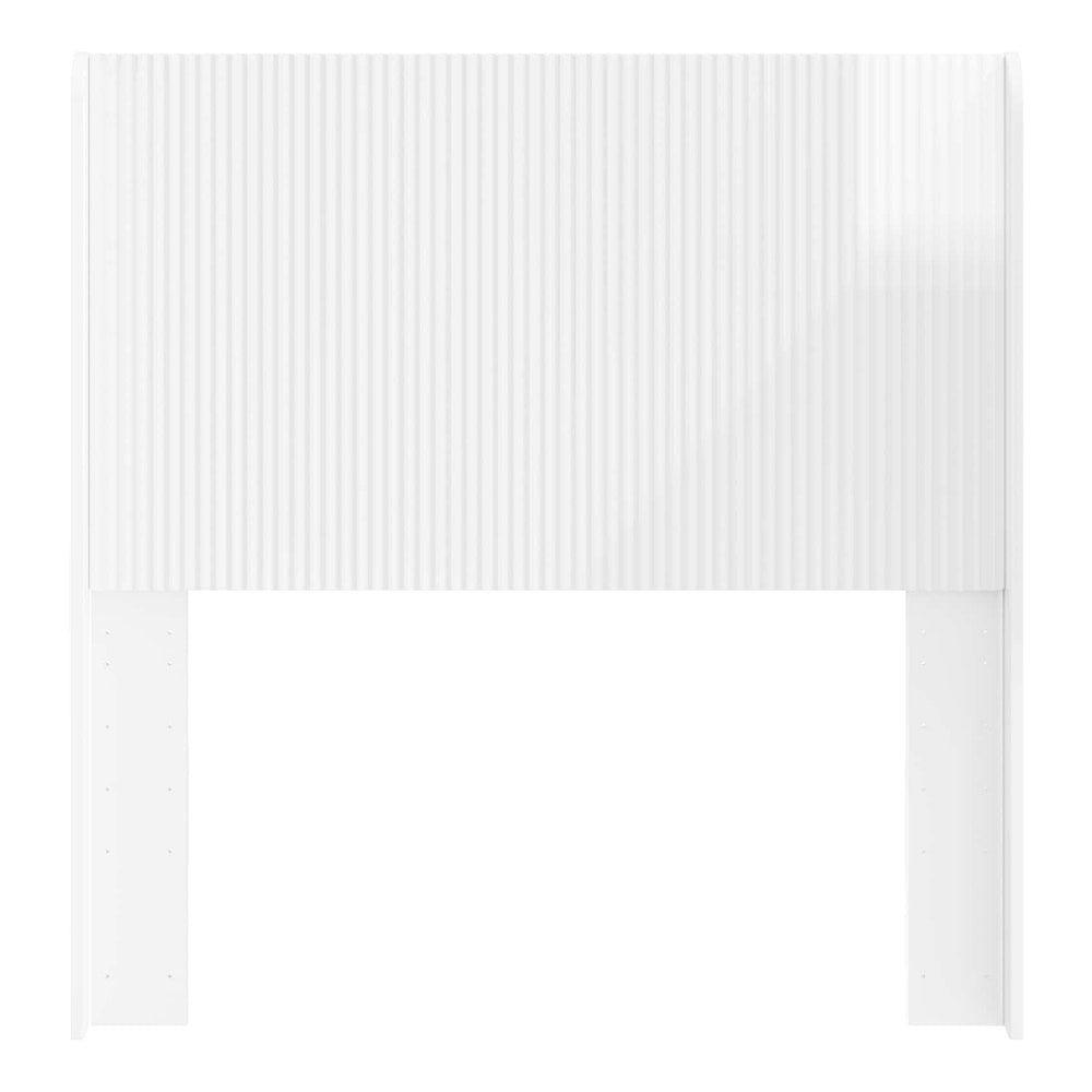 the white headboard with ribbed detail
