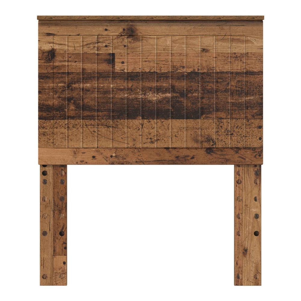 The engineered wood headboard has a planked design with visible nail heads