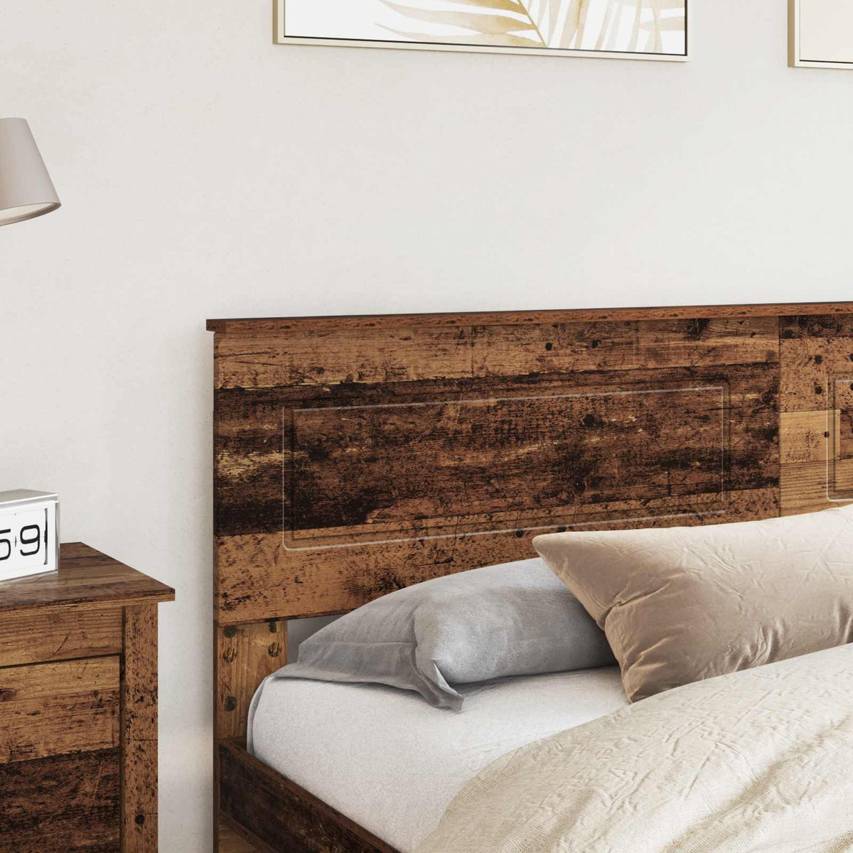Close-up of the old wood effect headboard fitted to a bed