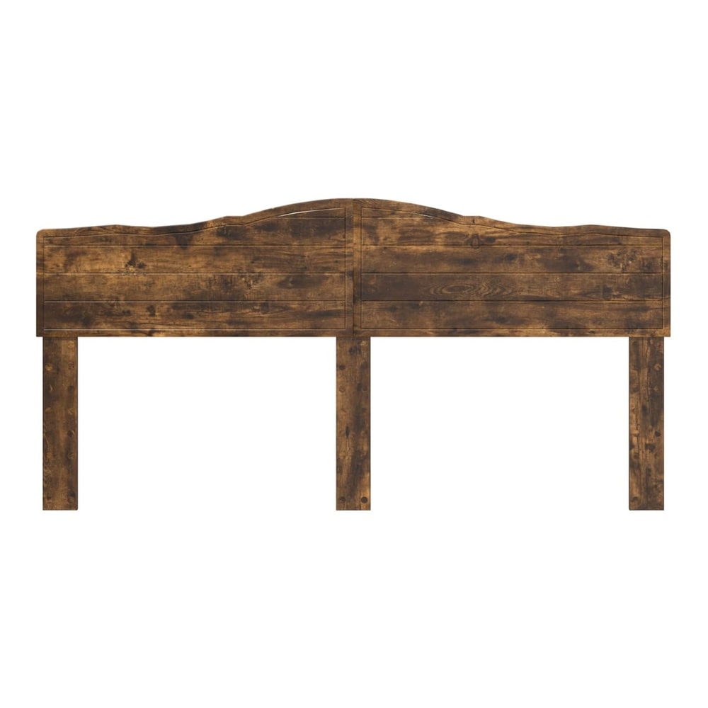A smoked oak engineered wood headboard with a rustic wood grain texture