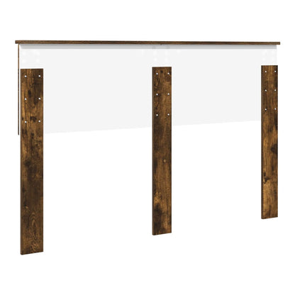 The smoked oak engineered wood headboard shown with its mounting brackets