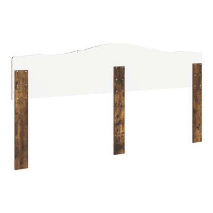 The back of the headboard showing the fixing points and wooden legs