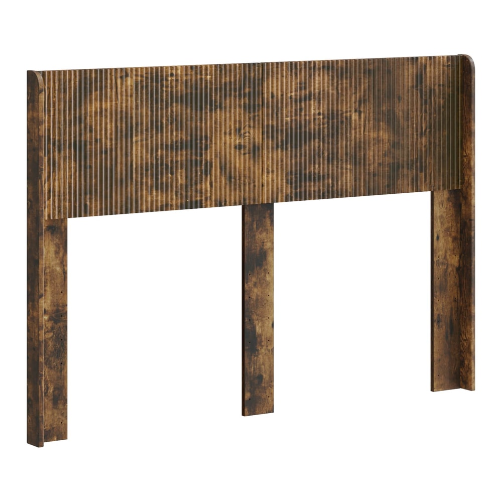 The headboard has a ribbed smoked oak effect finish and two side panels