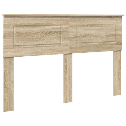 Sonoma oak engineered wood headboard with two rectangular panel details and legs