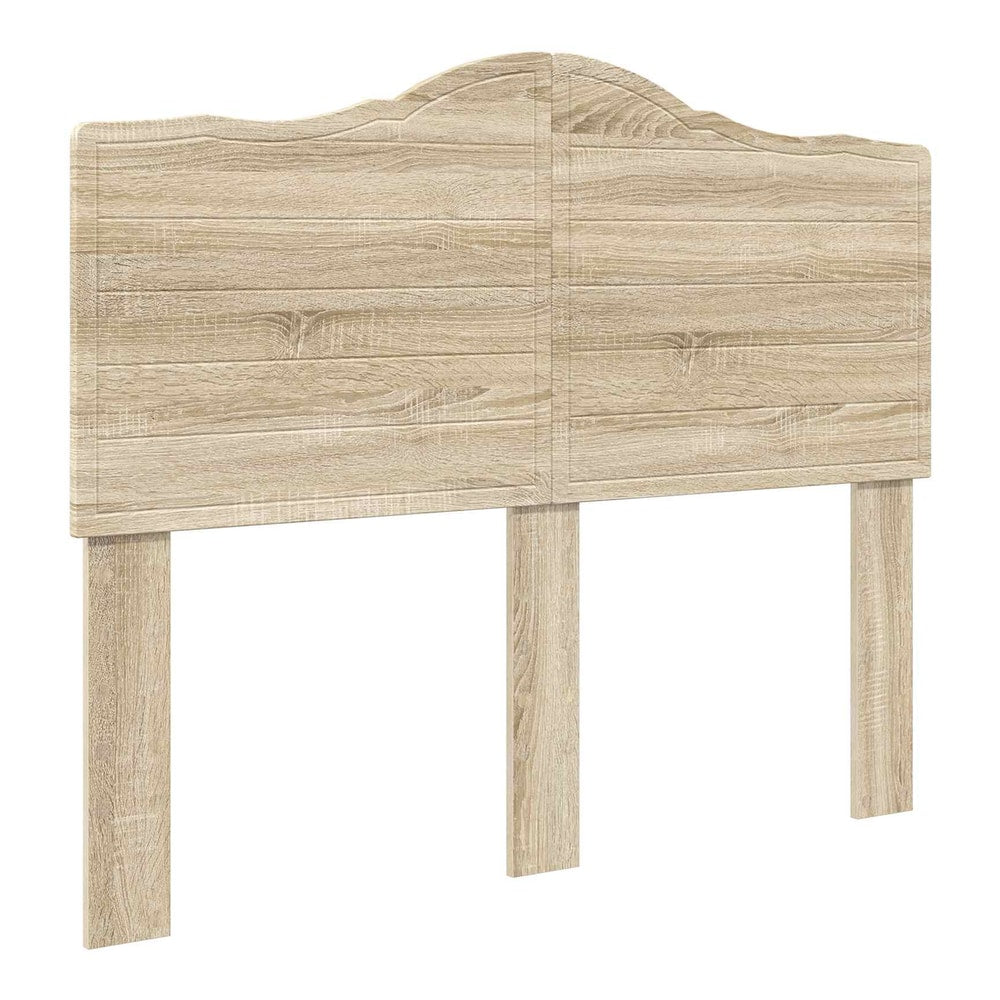 The headboard with a curved top edge and wood grain finish shown from a high angle