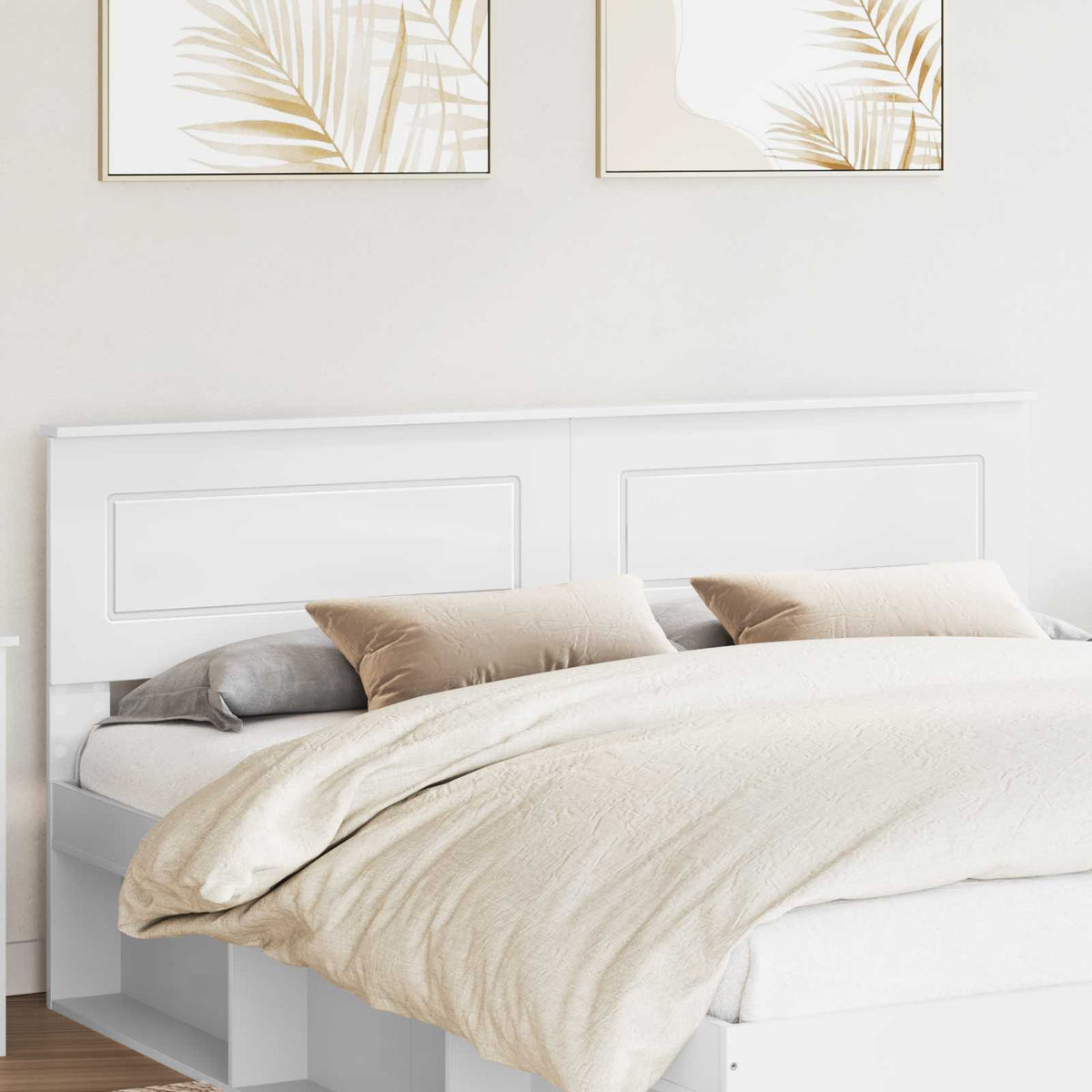 vidaXL Headboard White Engineered wood installed behind a bed with pillows and bedding in a bedroom