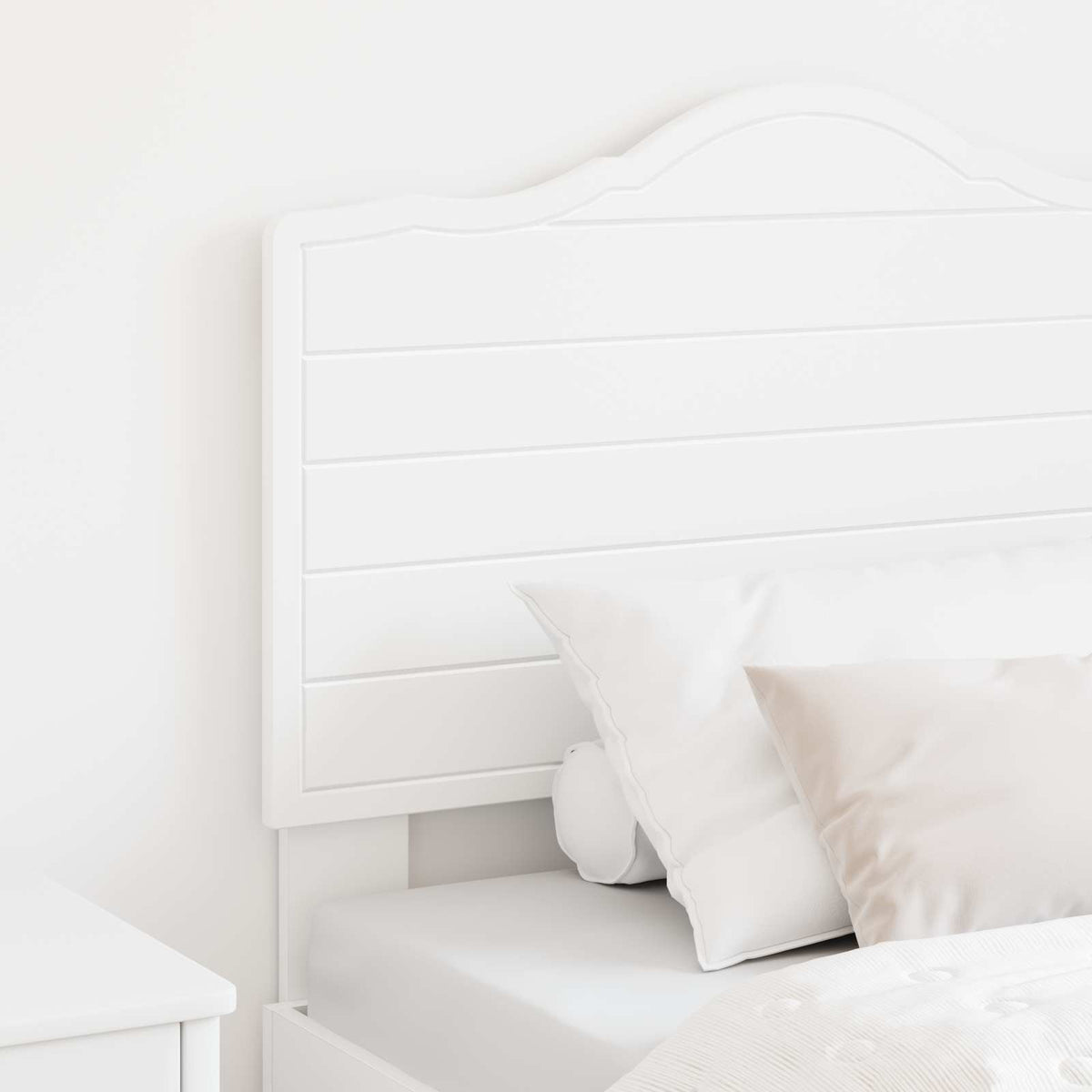 Close up of the white engineered wood headboard with horizontal panels