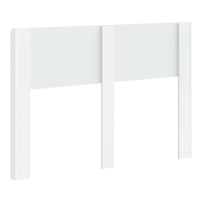 The back of the white headboard, revealing its mounting brackets