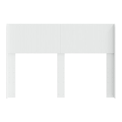 The white headboard standing alone, showing its structure and attachment points