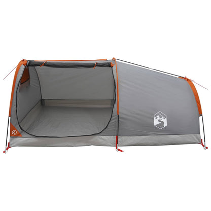 grey and orange two-person hiking tent with one side open showing interior