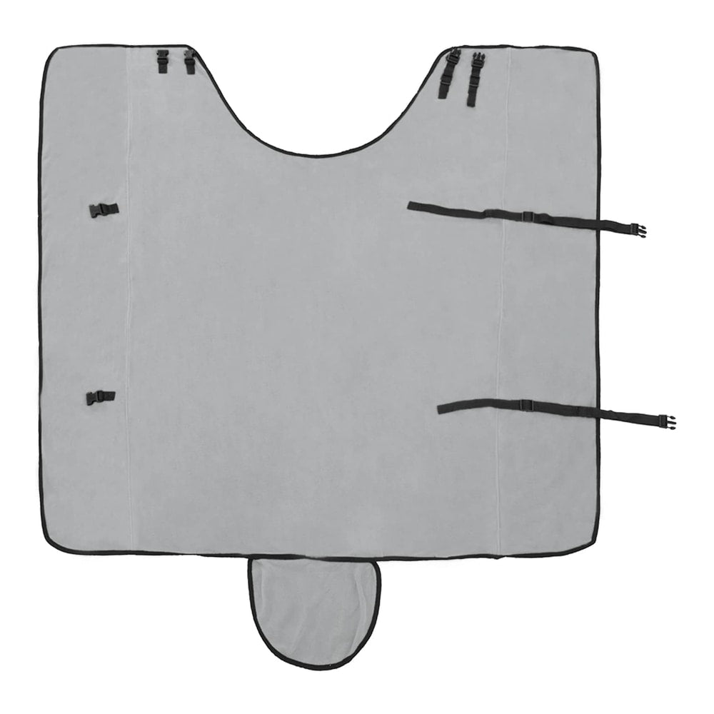 The inside of the light grey horse blanket showing the fastening straps