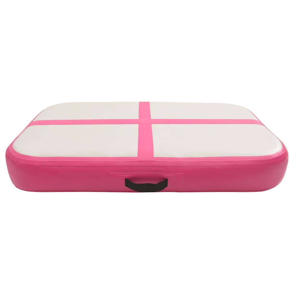 The inflatable gymnastics mat from the side, showing its thickness and a handle