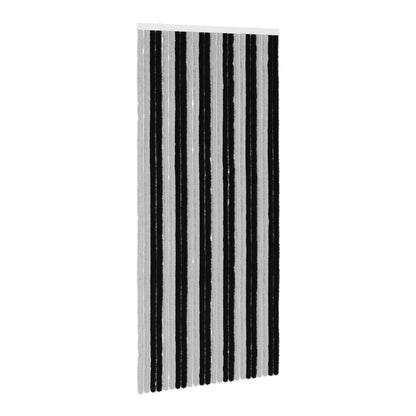 The insect curtain hanging against a white background, showing its grey and black stripes