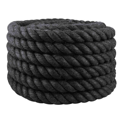 A close-up of a thick black jute rope coiled neatly